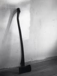 The actual ax from the Villisca Ax Murders against the wall