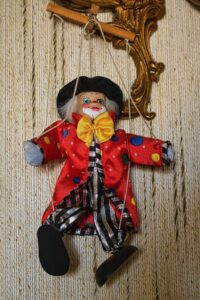 Clown doll hanging on the wall