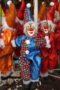 Clown dolls grinning