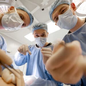 doctors about to dissect cadaver