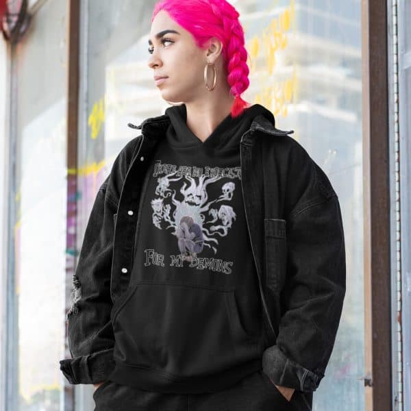alternative woman with demon design hoodie and pink hair
