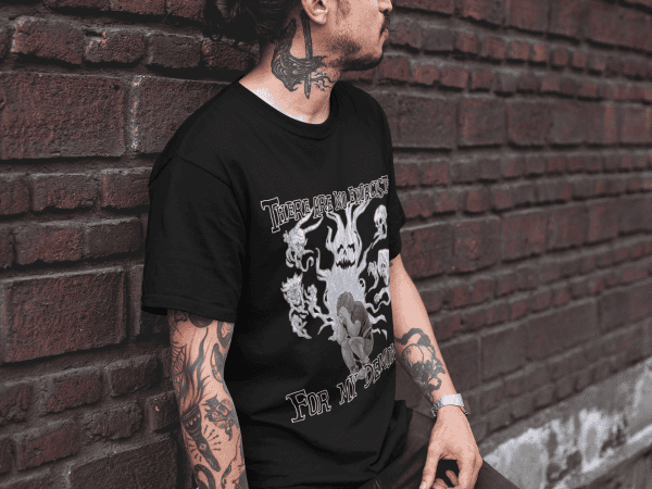 grunge man leaning against wall and wearing no exorcists t-shirt