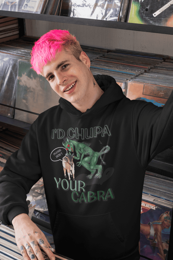 pink haired punk wearing black chupacabra hoodie for nu metal goths