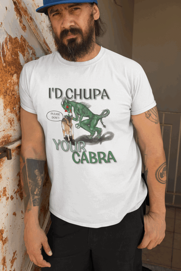 Man wearing chupacabra shirt and leaning against the wall