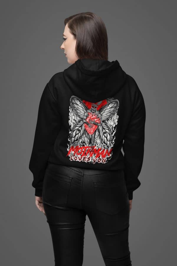 woman dressed in alternative style is wearing mothman loves you hooded sweatshirt