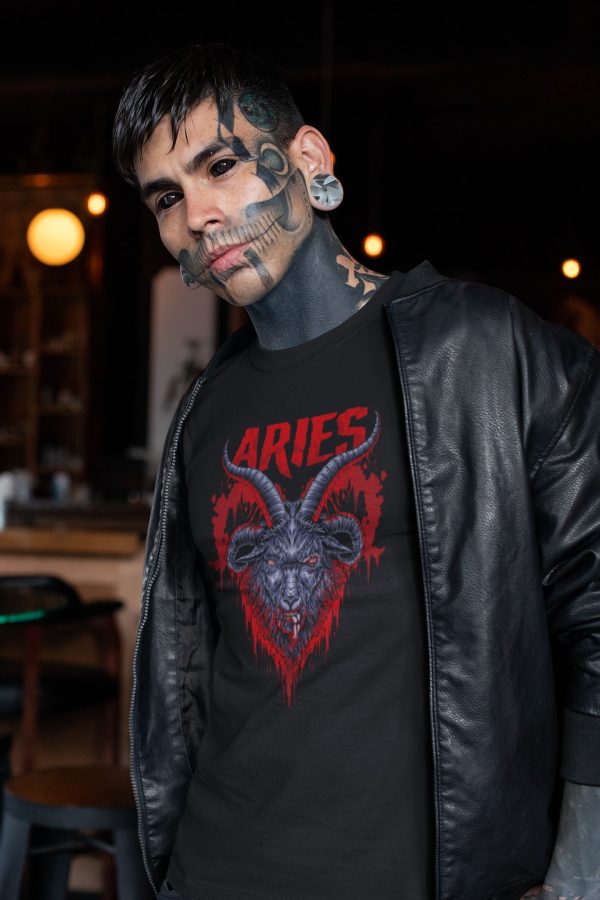 goth man with black contacts in detailed aries zodiac t shirt with bloody ram's head design