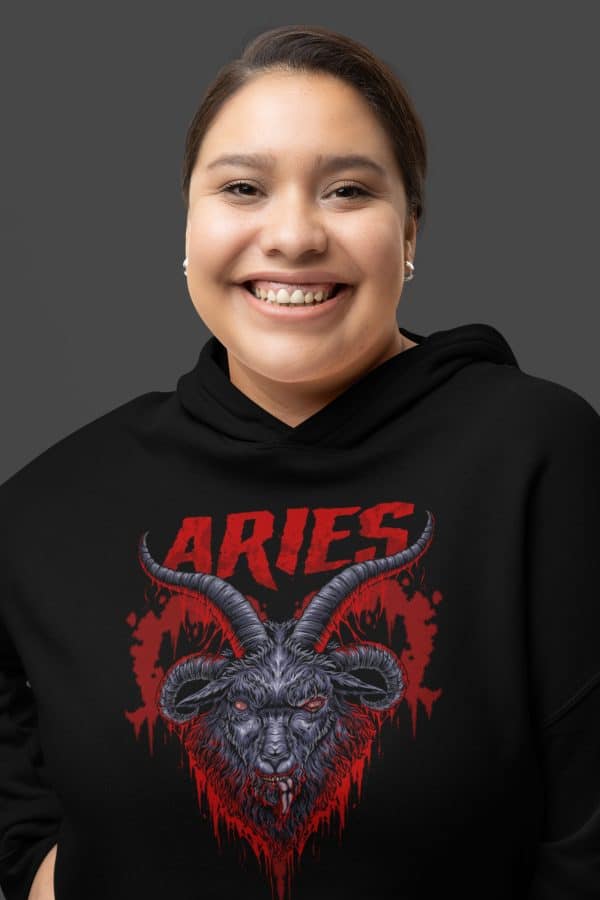 plus sized model smiling in cropped aries hoodie