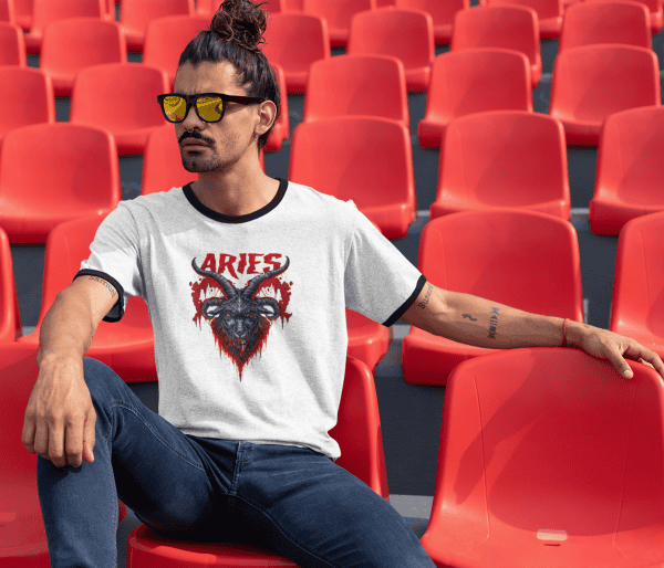 punk man sitting while wearing retro ringer featuring bloody aries sign ram design