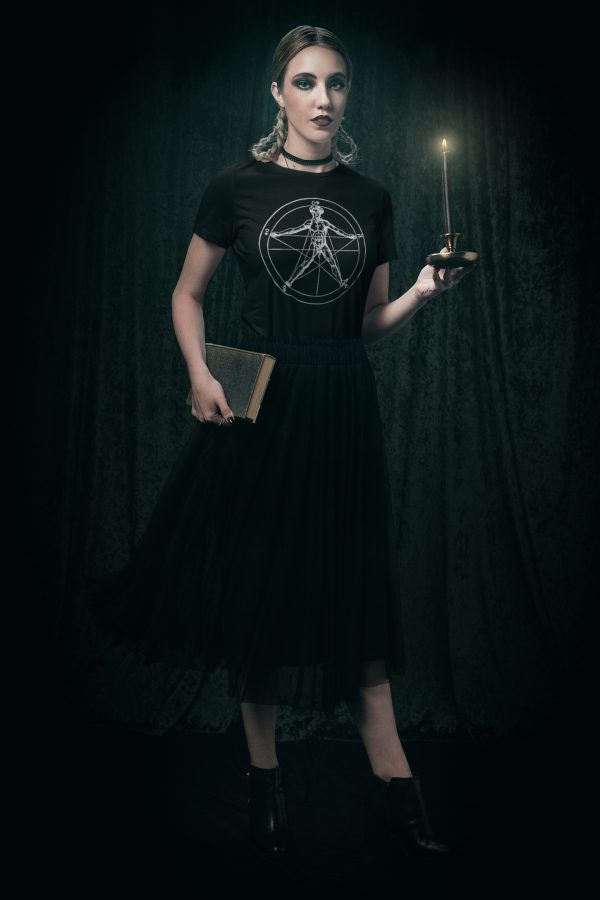 spooky witch woman holding candle while wearing agrippa pentagram tee shirt by obscurix