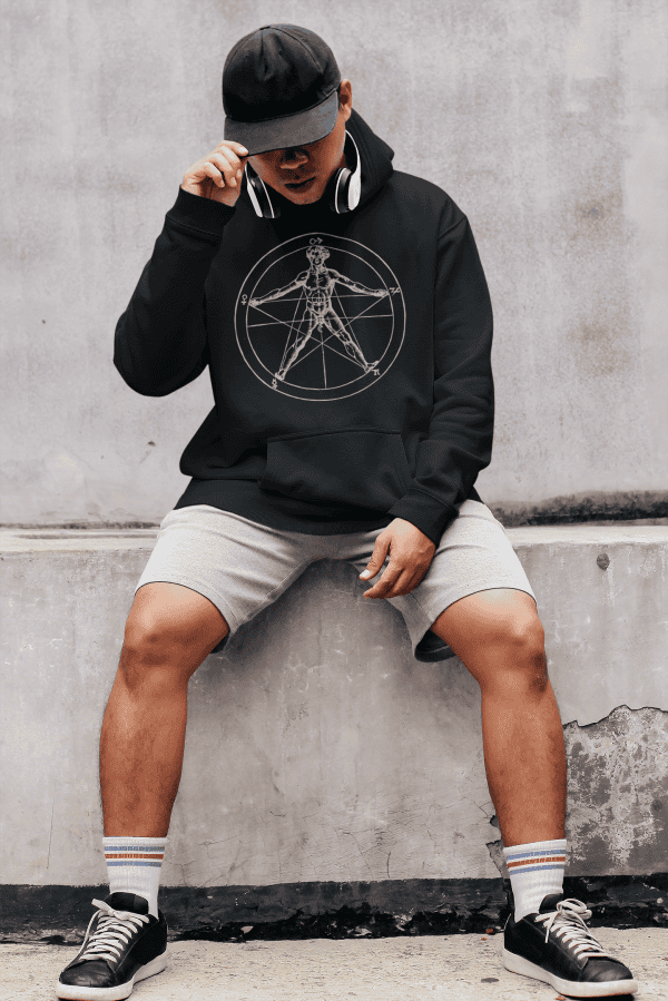 man sitting in agrippa's pentagram occult streetwear hoodie