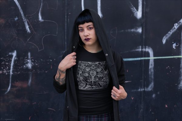goth model posing in black occult t-shirt featuring azoth mandala symbol