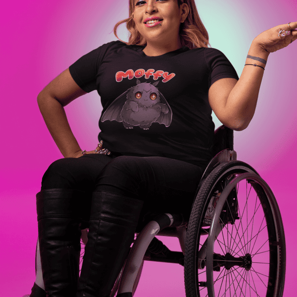woman wearing in chibi mothman tee in wheelchair
