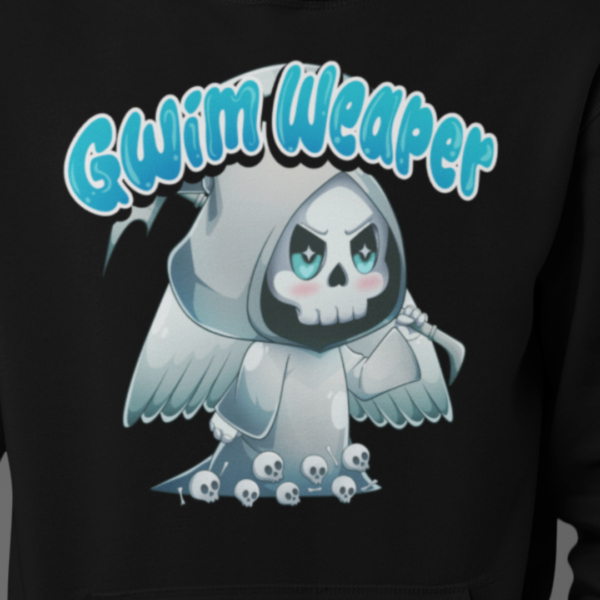 close up of soft goth style kawaii grim reaper design on black hoodie