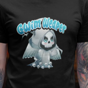 close up of alt style chibi grim reaper design on a black t-shirt
