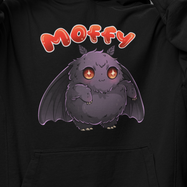 close up of adorable kawaii mothman design on black hoodie