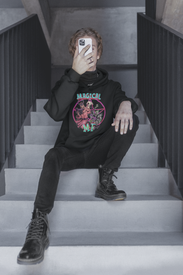 gothic man on stairs wearing magical mf hoodie with necromancer design