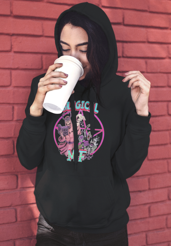 grunge style woman wearing black magical mf hoodie and drinking coffee