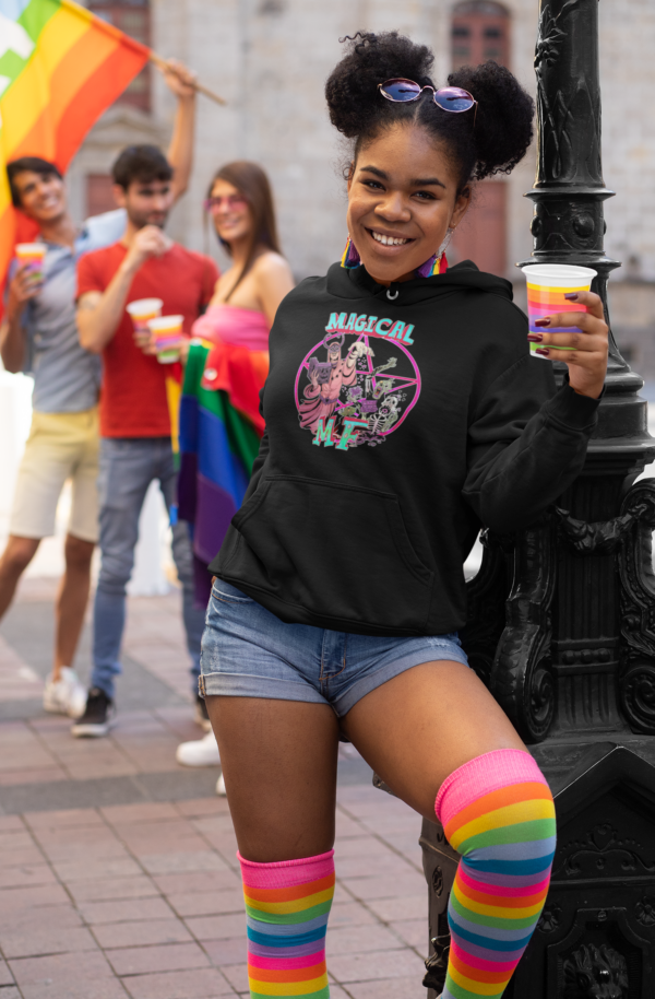 queer punk woman wearing magical mother fucker hoodie and rainbow socks