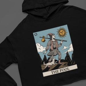 close up of the fool tarot card design on a major arcana, black cropped hoodie
