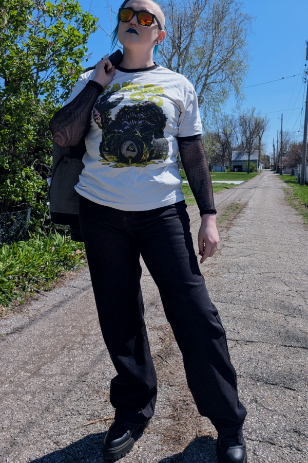 alt style goth woman wearing black skater jeans by shaka wear