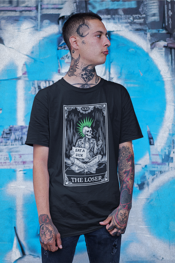 tattooed punk man in the loser tarot shirt with skeleton design