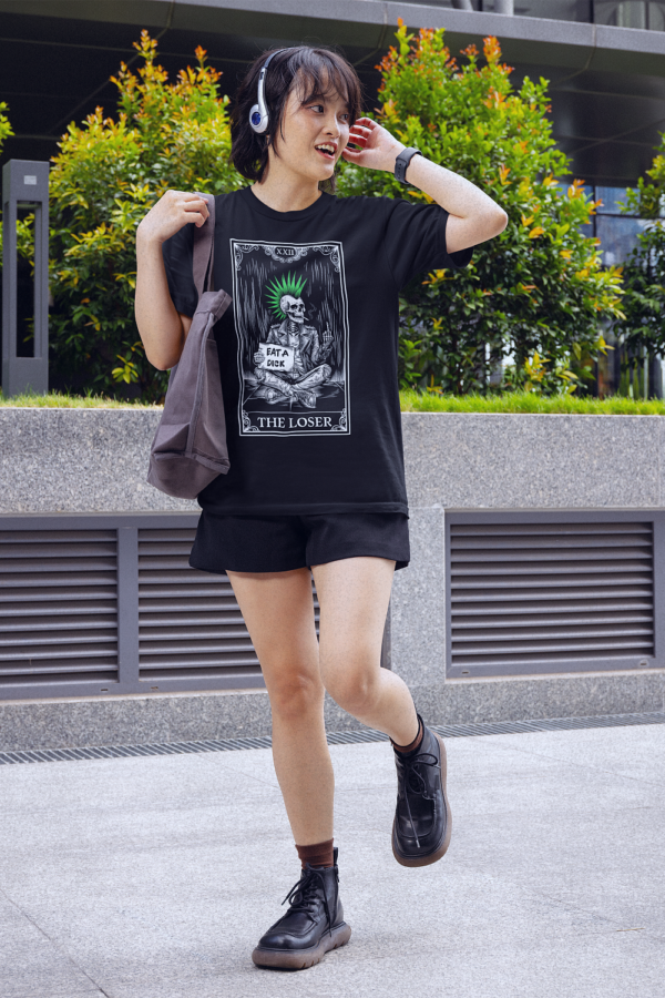 young punk woman rocking the loser tarot card design on black tee