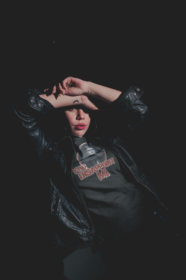alt style model wearing leather jacket and john brown tee