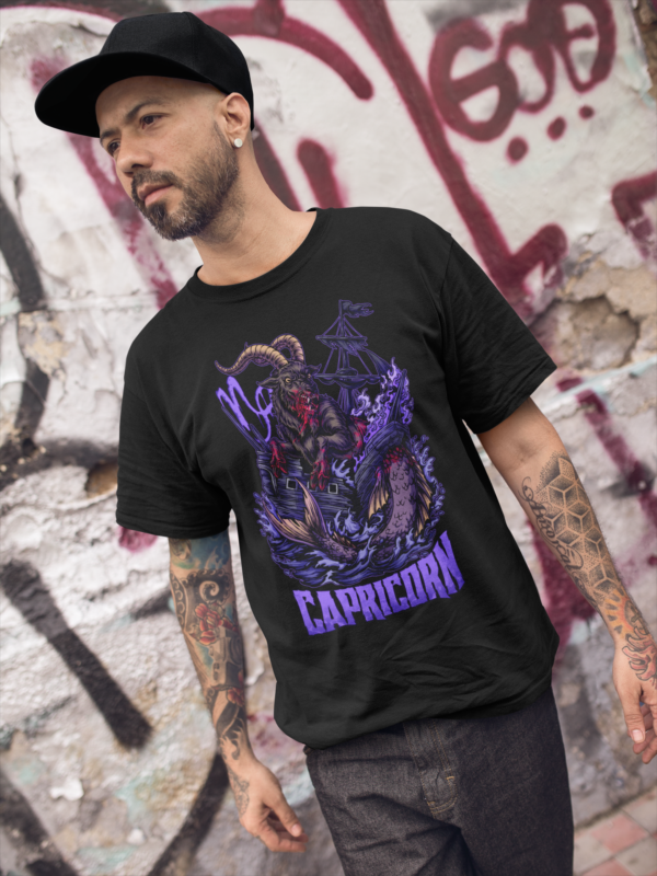 alternative man modeling the dark capricorn zodiac design on black t shirt