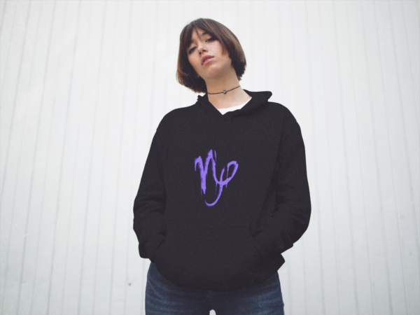 alternative style woman wearing the horror art design of capricorn sign on hoodie