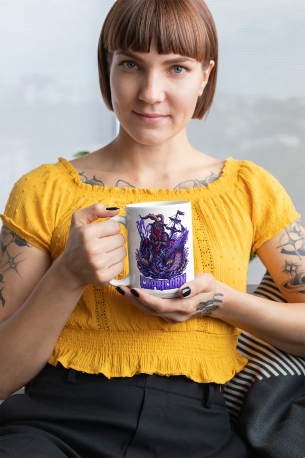 alternative woman holding 15 ounce dark art capricorn horoscope mug