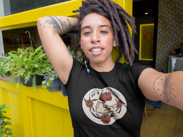 alternative woman with face piercings in political dirty commie t shirt