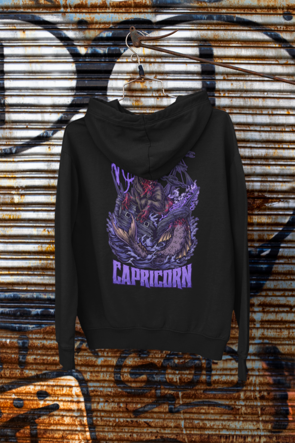 goth style capricorn sign pullover hoodie hanging on hanger in alley