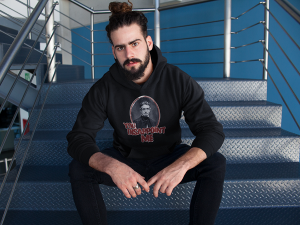 grunge model in john brown hoodie with political statement