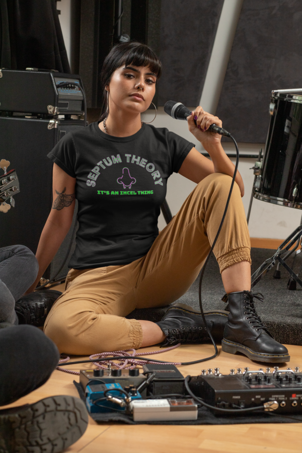 punk woman on sound stage in political tee about septum theory