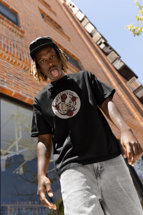 skater in black shirt with funny tattoo style communist design