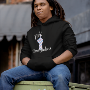 skater punk wearing fuck transphobes hoodie and sitting on dumpster