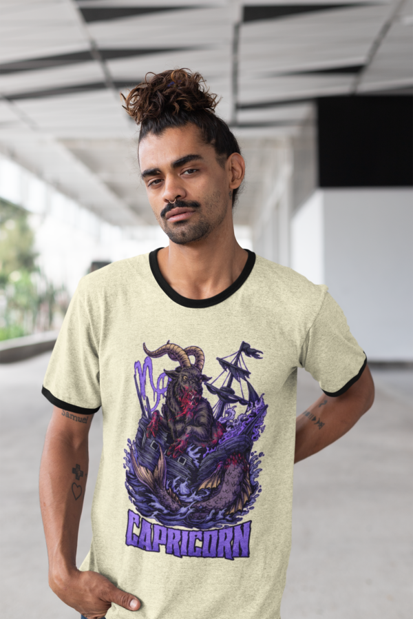 skater punk rocking the vintage style dark capricorn sign design on a retro ringer t-shirt