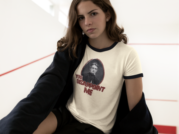 young alt style woman in john brown anti-racist ringer t shirt