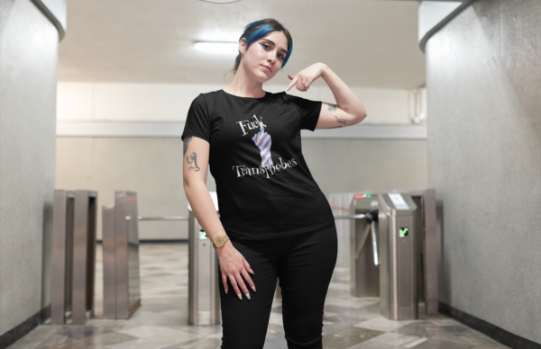 alt woman with blue hair in black t-shirt to support trans people