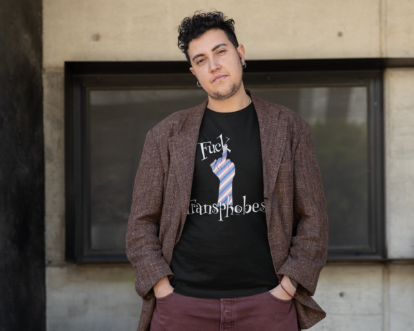 model in grunge clothing wearing left wing fuck transphobes t-shirt