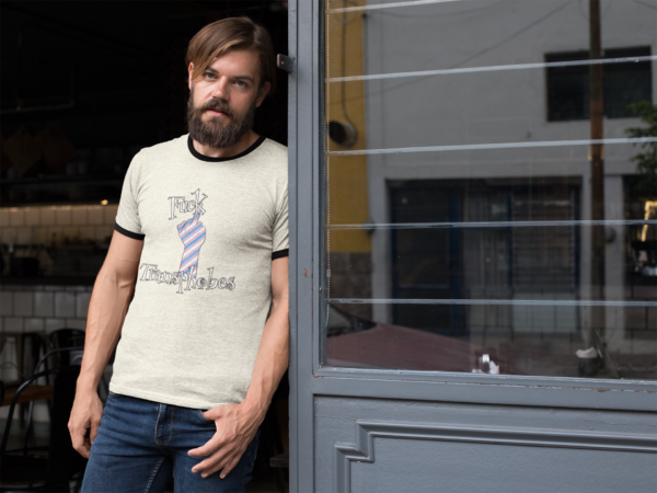 punk man wearing ringer tee with lgbt pride design that has transgender flag colors